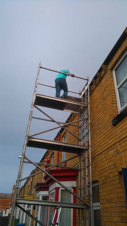 Roofer on scaffolding image for gallery